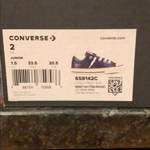 Boy’s slip on leather Converse sneakers